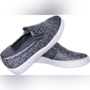 Michael Kors black slip on sneakers